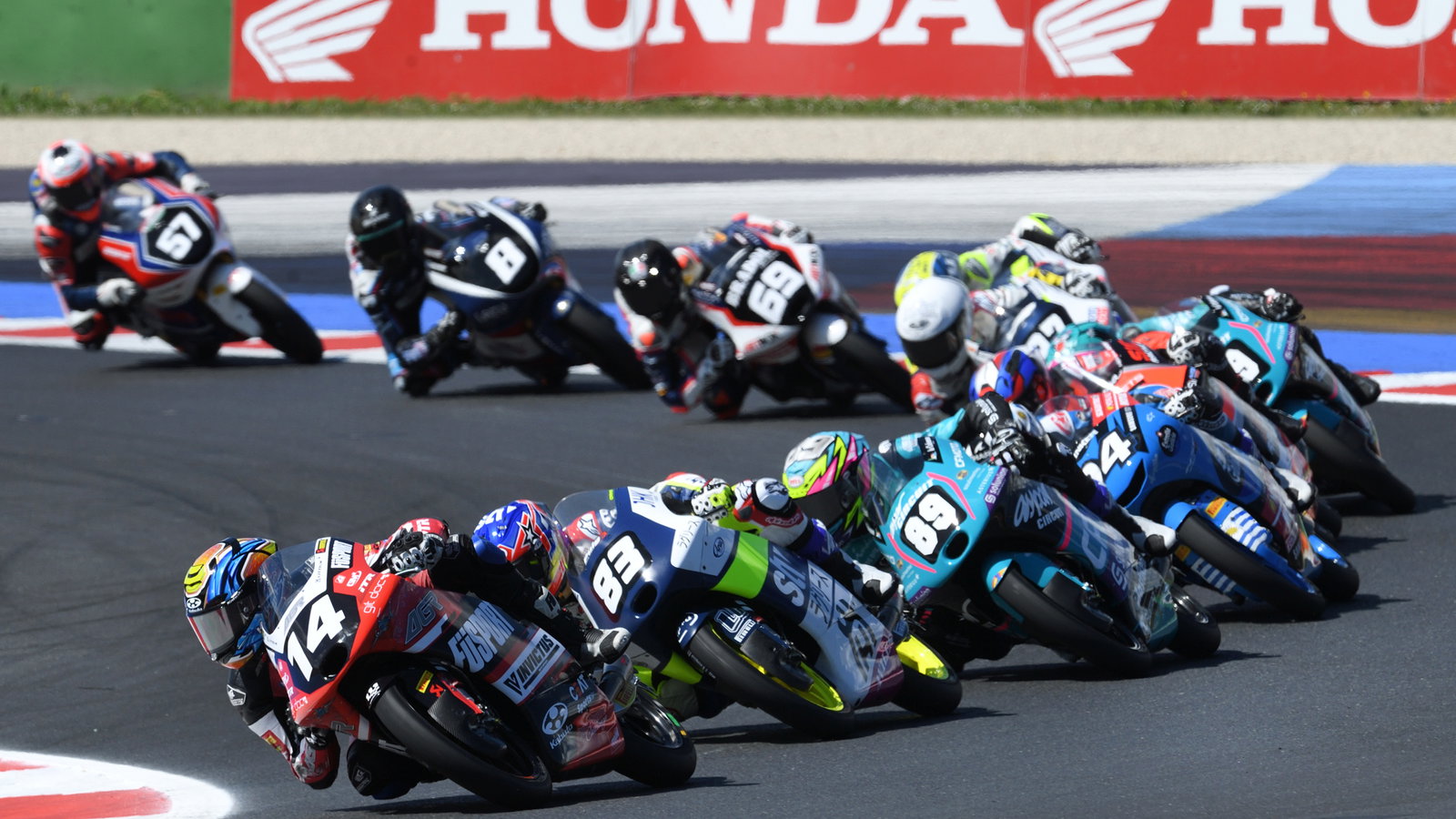 Cormac Buchanan (#14) leads Moto3 group, 2024 Emilia-Romagna JuniorGP. Credit: JuniorGP.